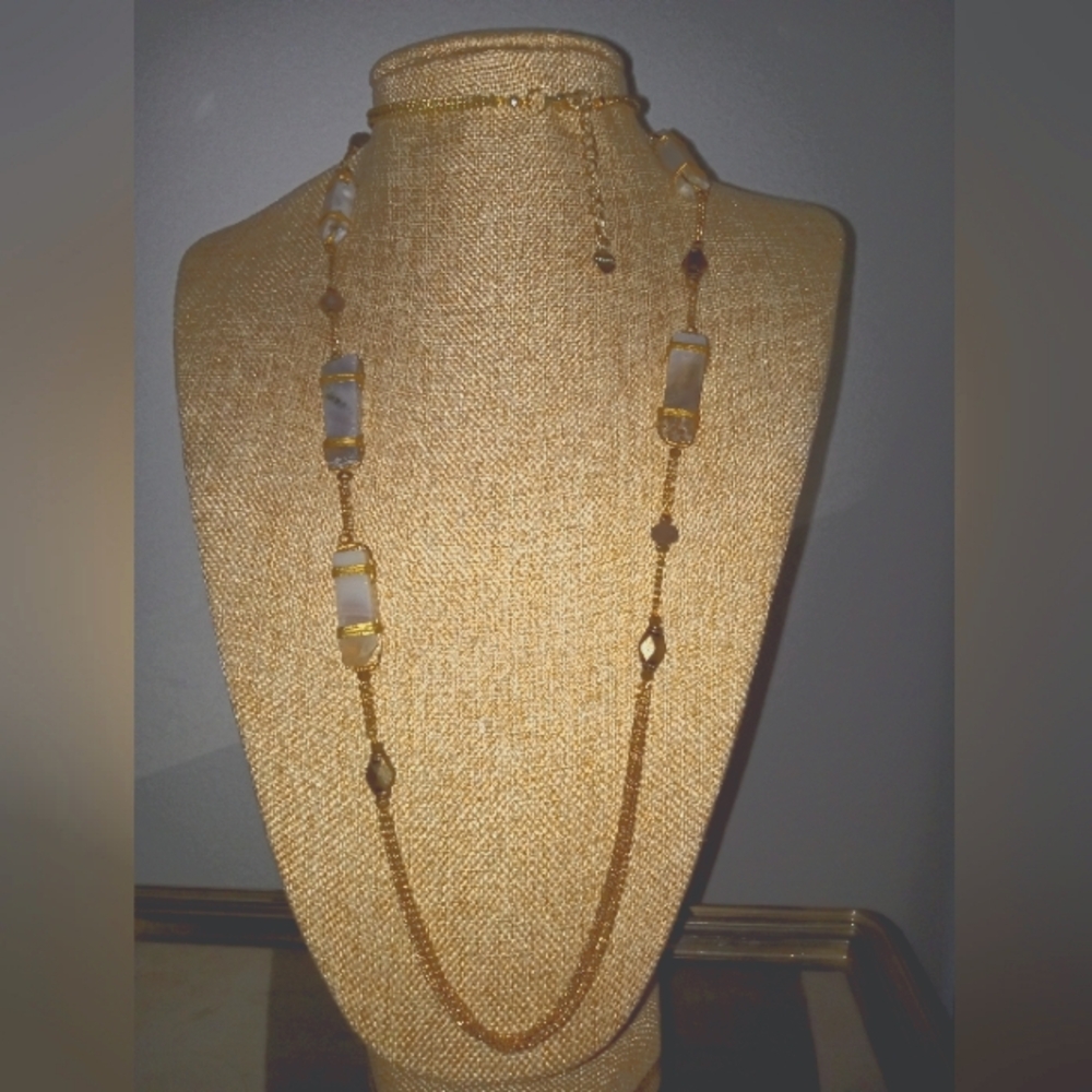 Uniquely Elegant Gold And White Necklace